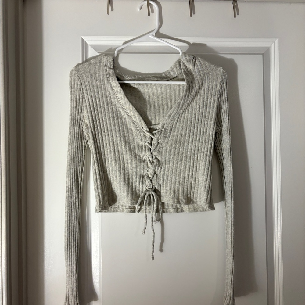 Tan sweater that ties up